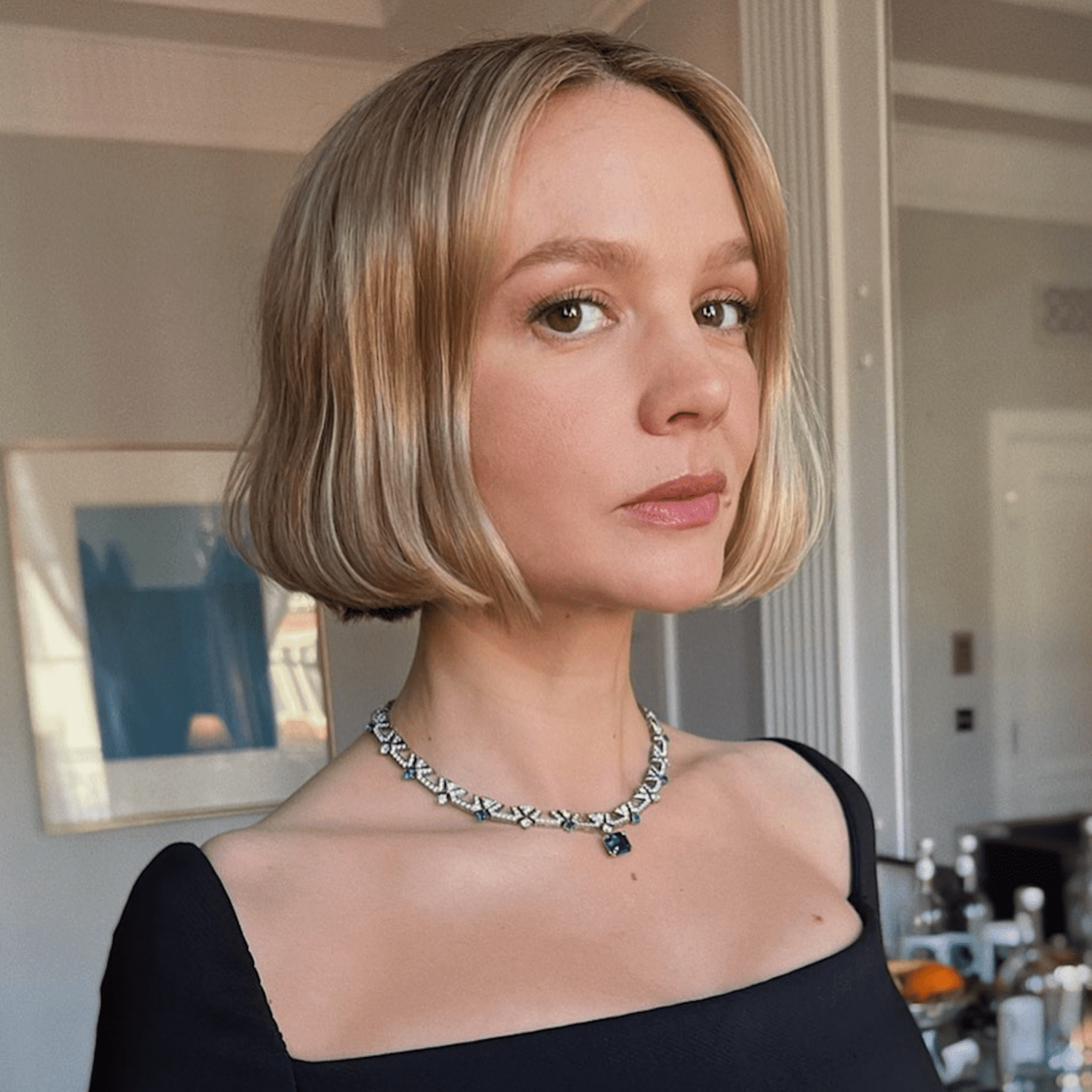 Carey Mulligan wears a blunt mushroom bob that grazes her jawline